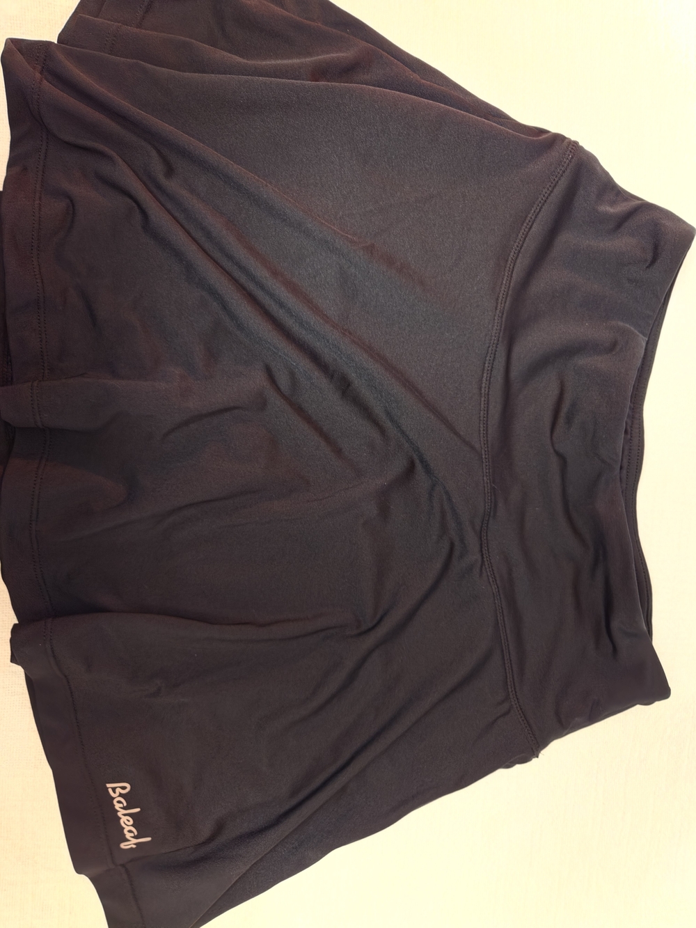 Baleaf Women's Black Athletic Skort with Subtle Logo